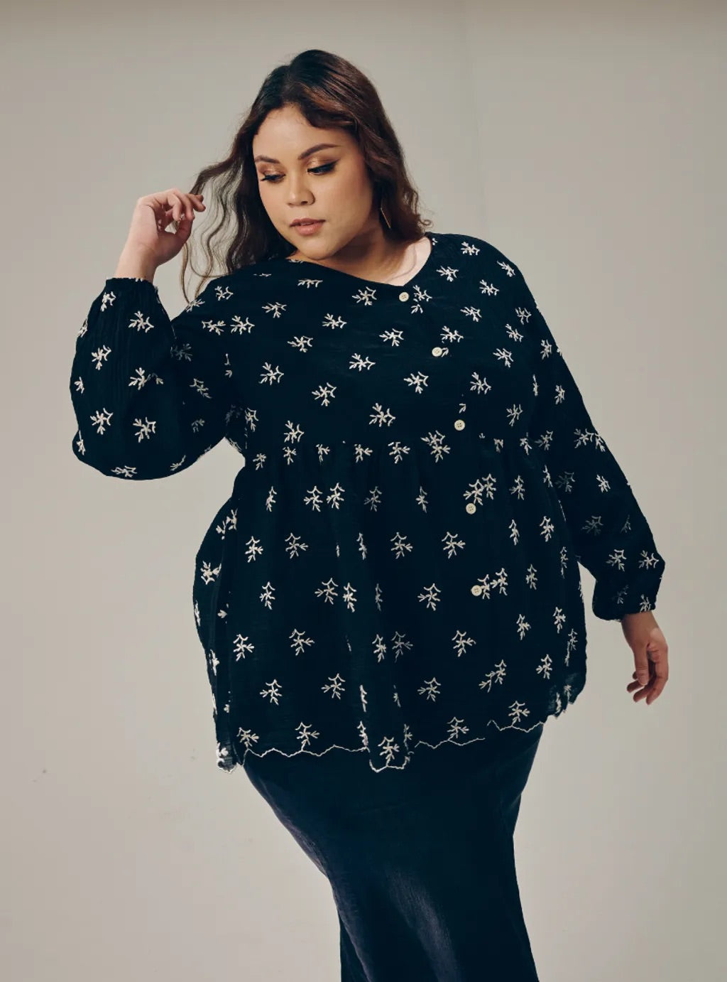 Atasan Ava Peplum Embroidered Top