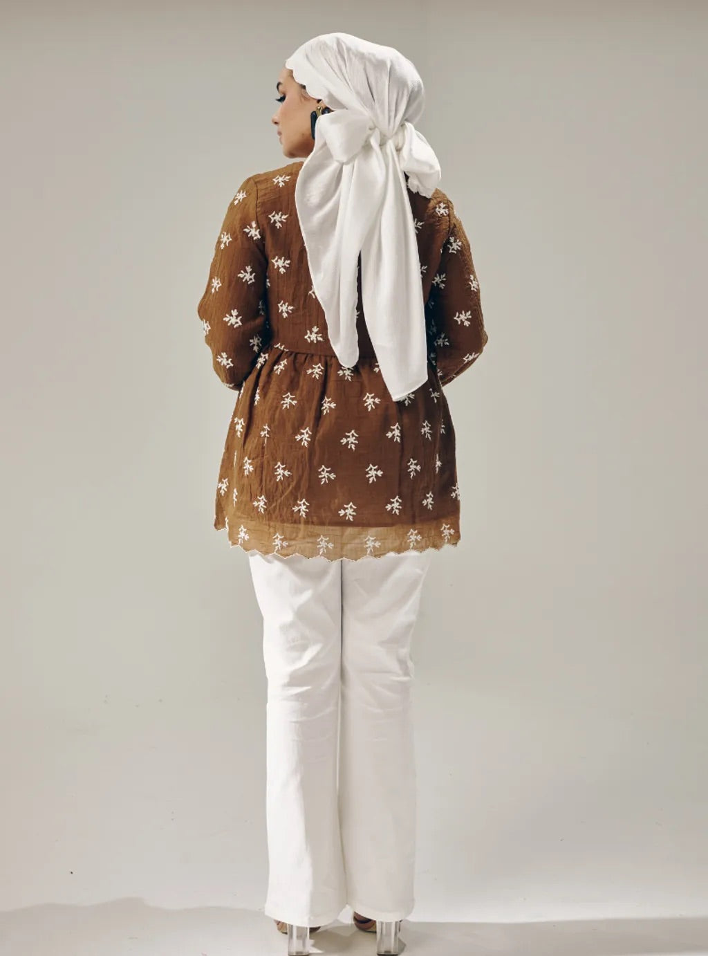 Atasan Ava Peplum Embroidered Top