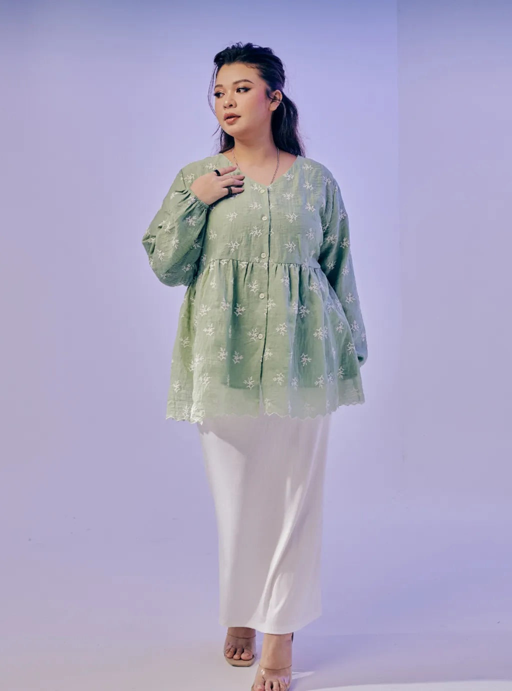 Atasan Ava Peplum Embroidered Top