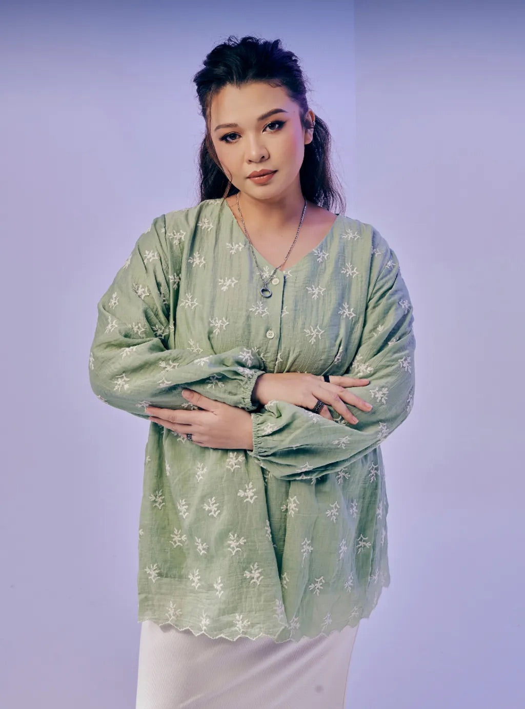 Atasan Ava Peplum Embroidered Top