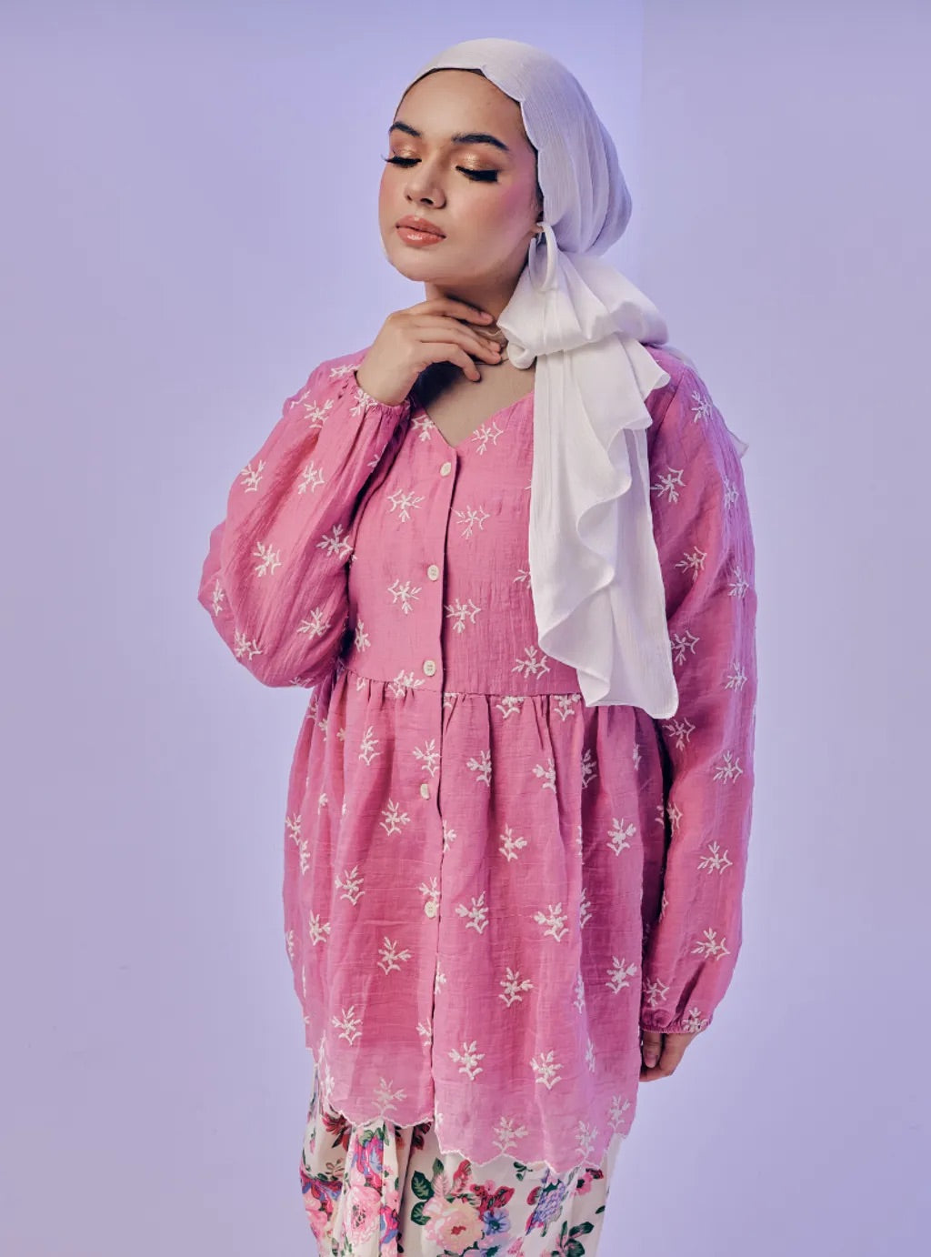 Atasan Ava Peplum Embroidered Top