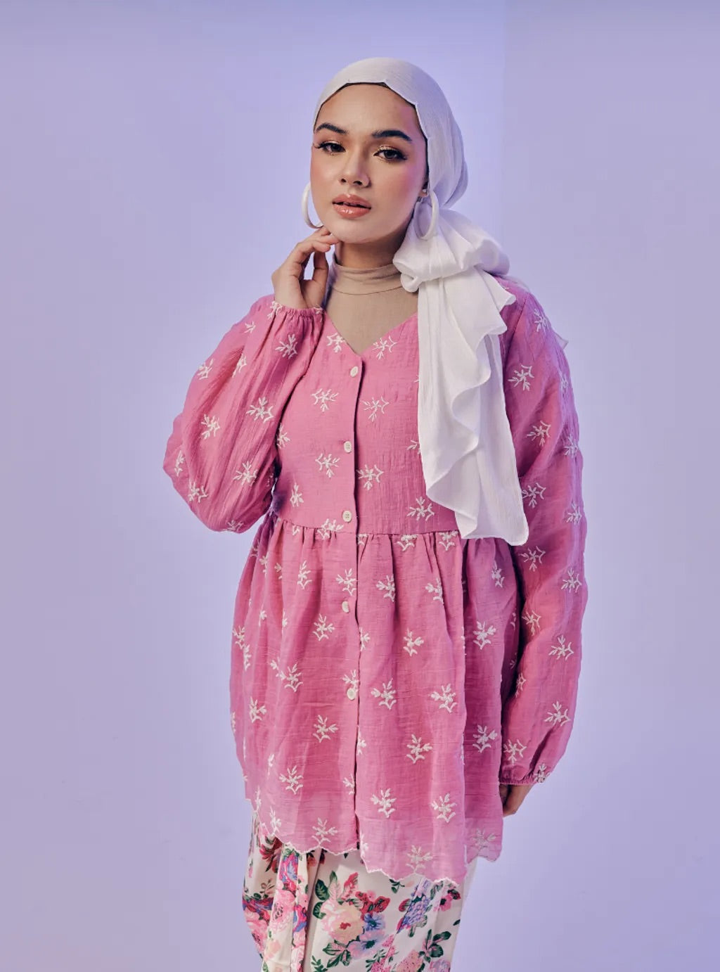 Atasan Ava Peplum Embroidered Top