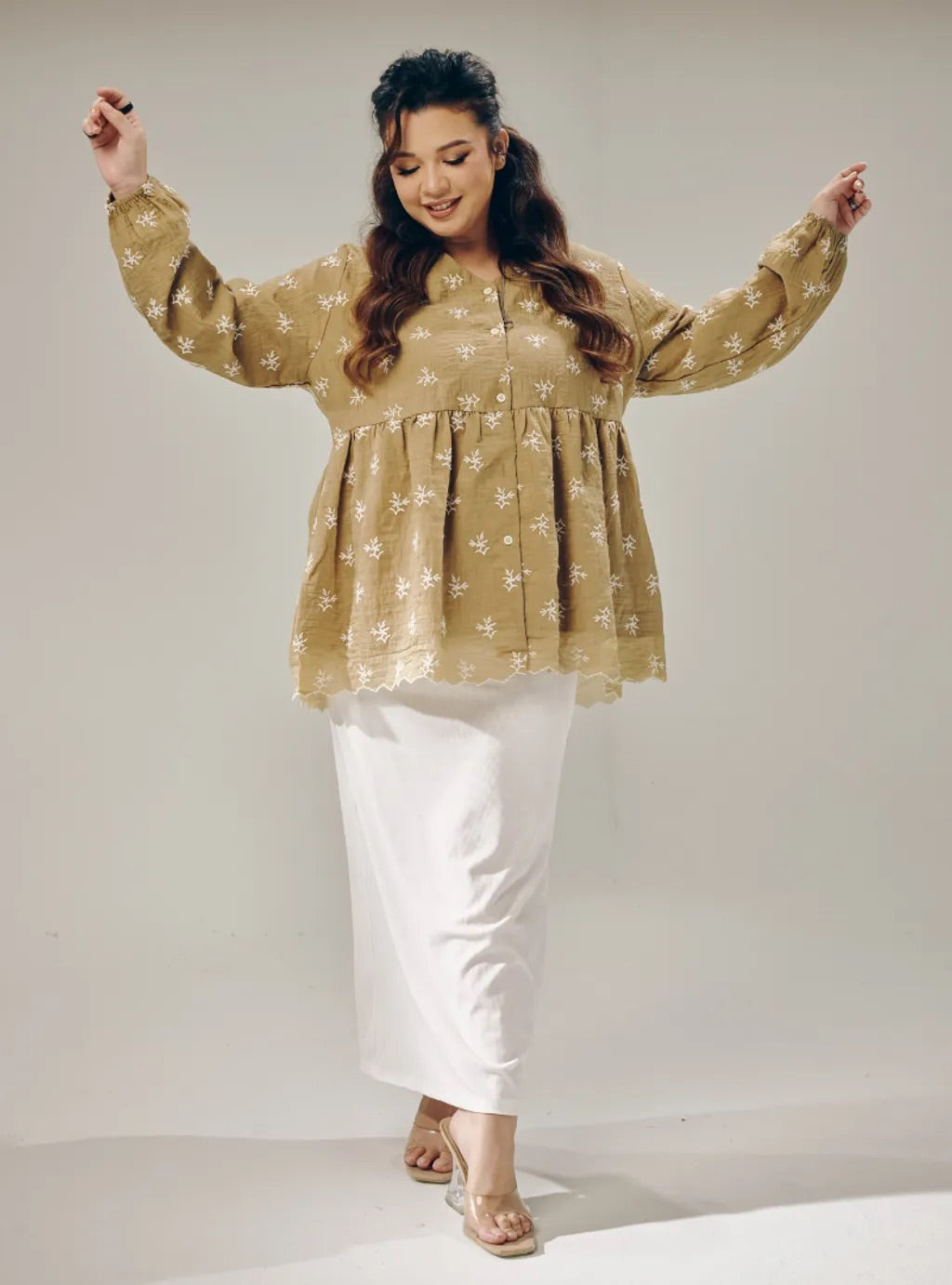 Atasan Ava Peplum Embroidered Top